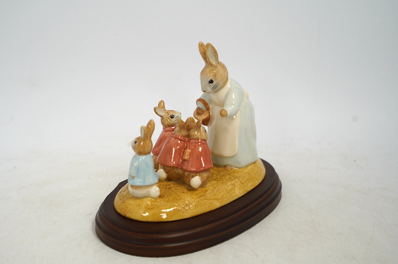 Seven John Beswick boxed figures to include Mrs Rabbit & four bunnies. Condition - good